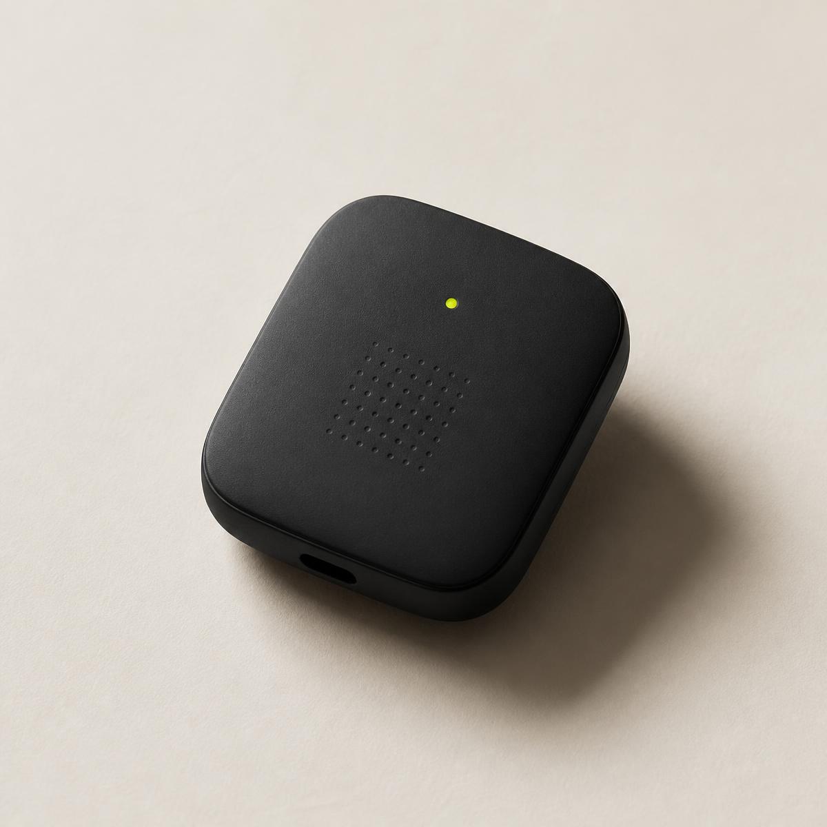 The Flock Block device: a small matte black square with a single green indicator light